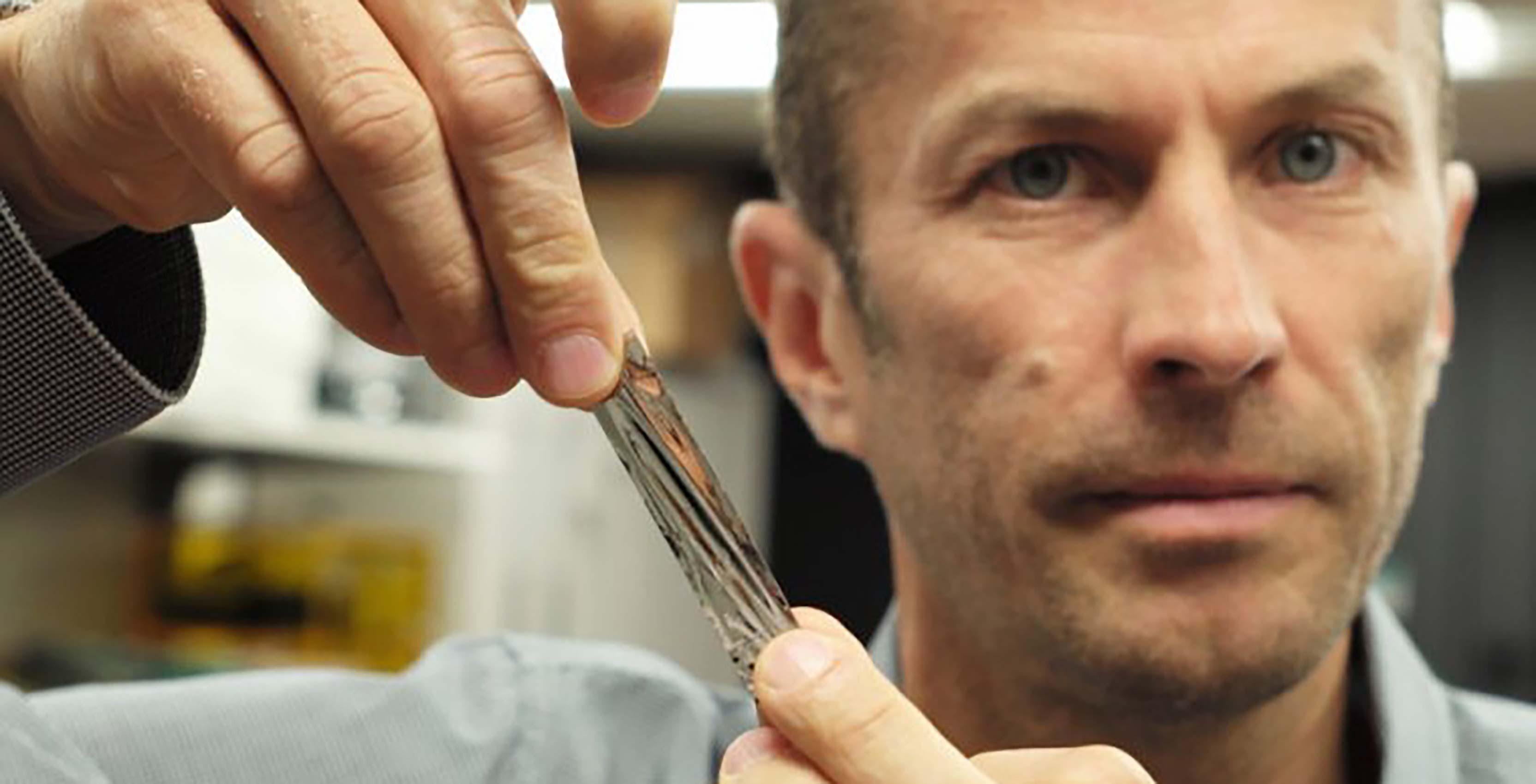 IBM scientist with storage tape