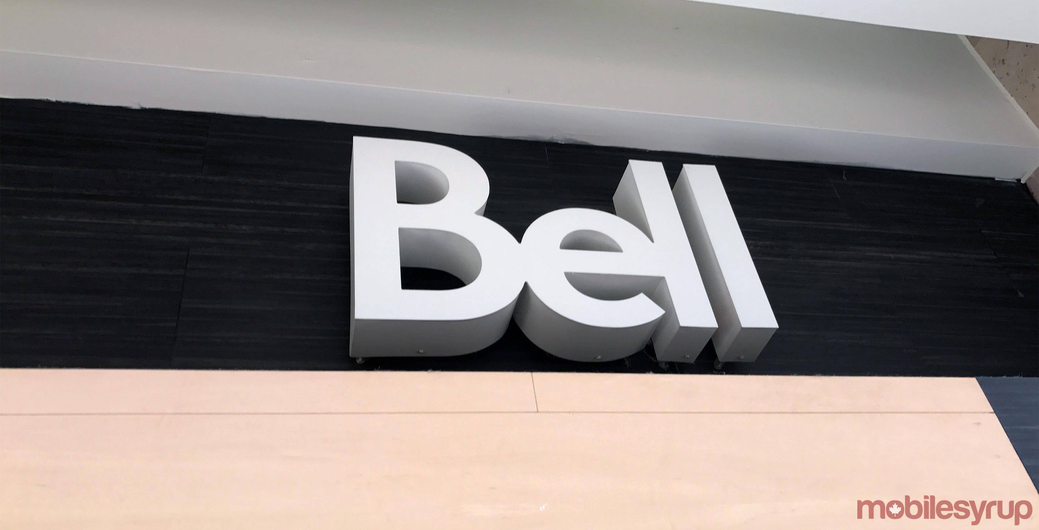 Bell sign on wall