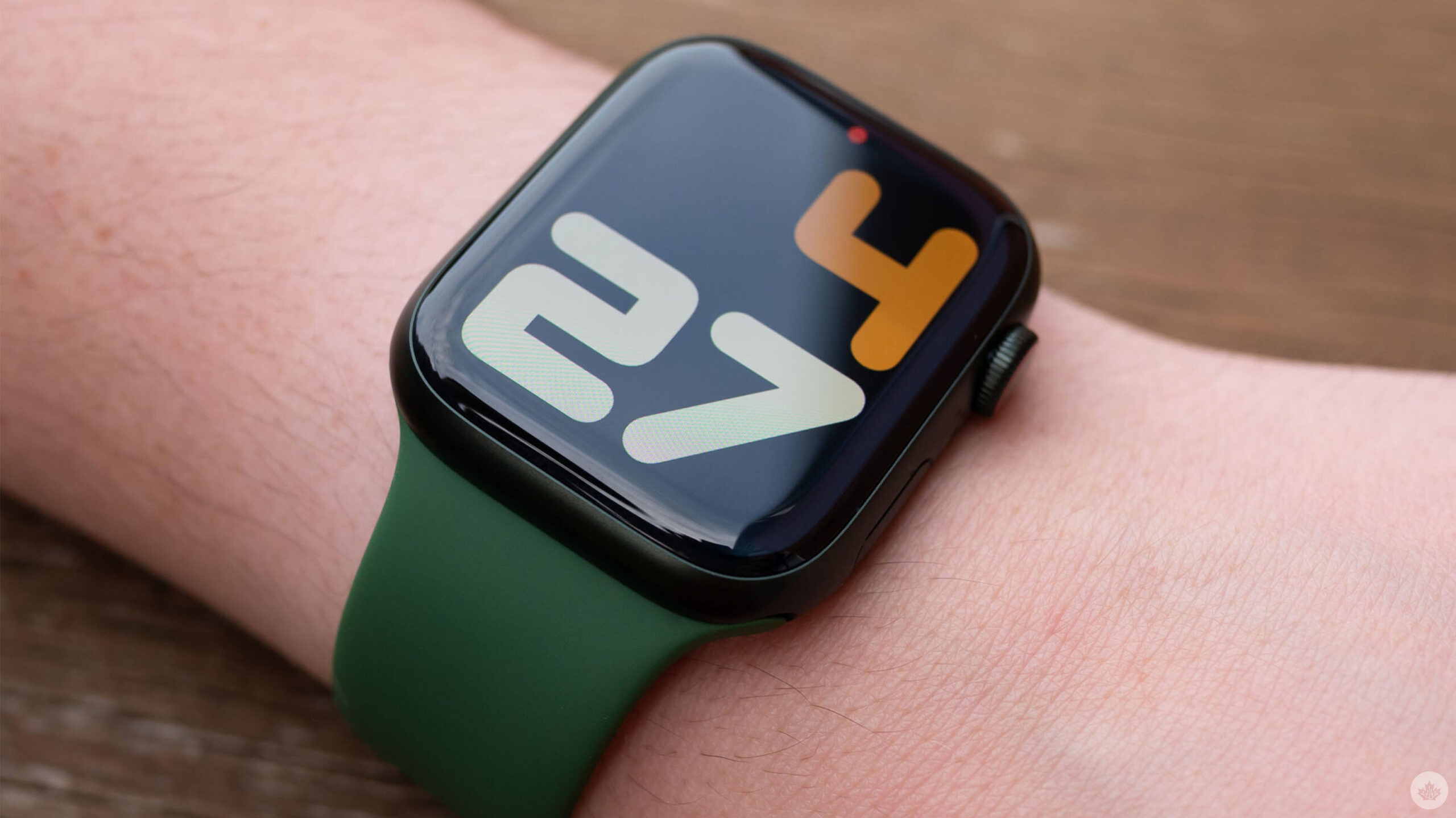 Apple Watch Series 7 with a green strap