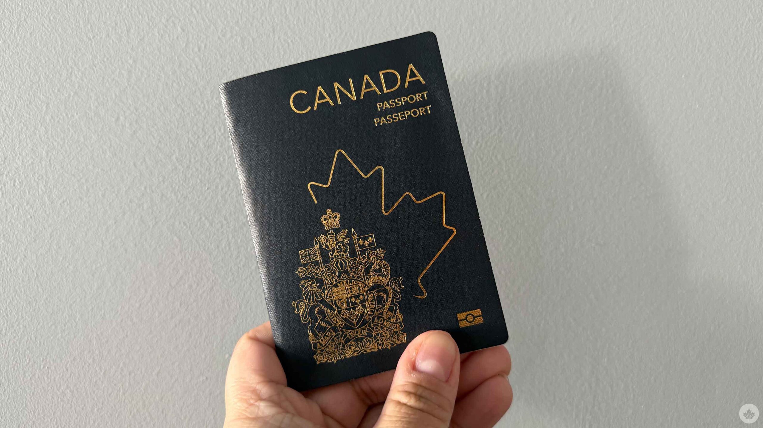 Canadian passport in hand