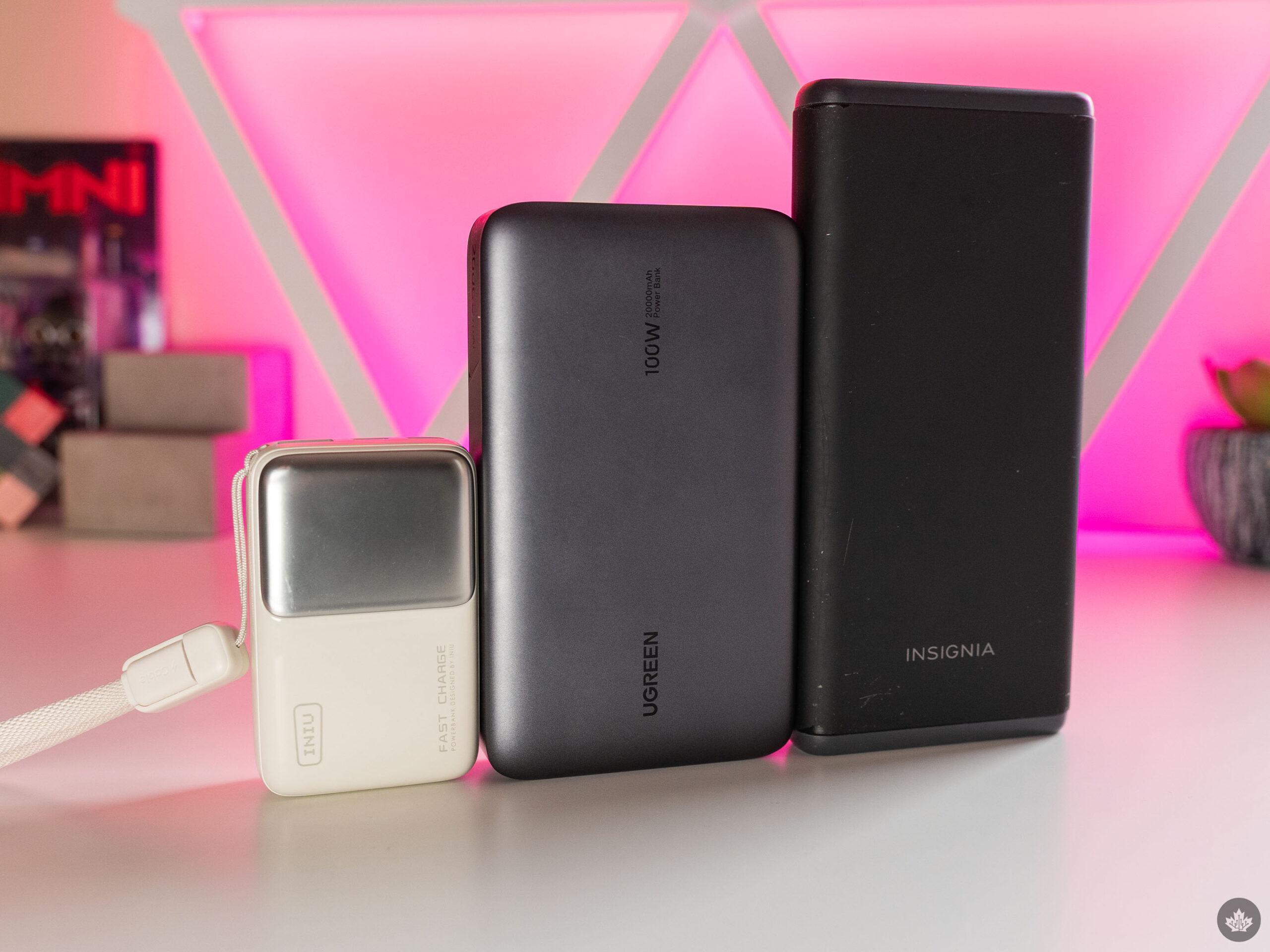 Comparing the sizes of power banks. From left to right, Iniu P50 10,000mAh, Ugreen Nexode 20,000mAh, Insignia 15,000mAh.