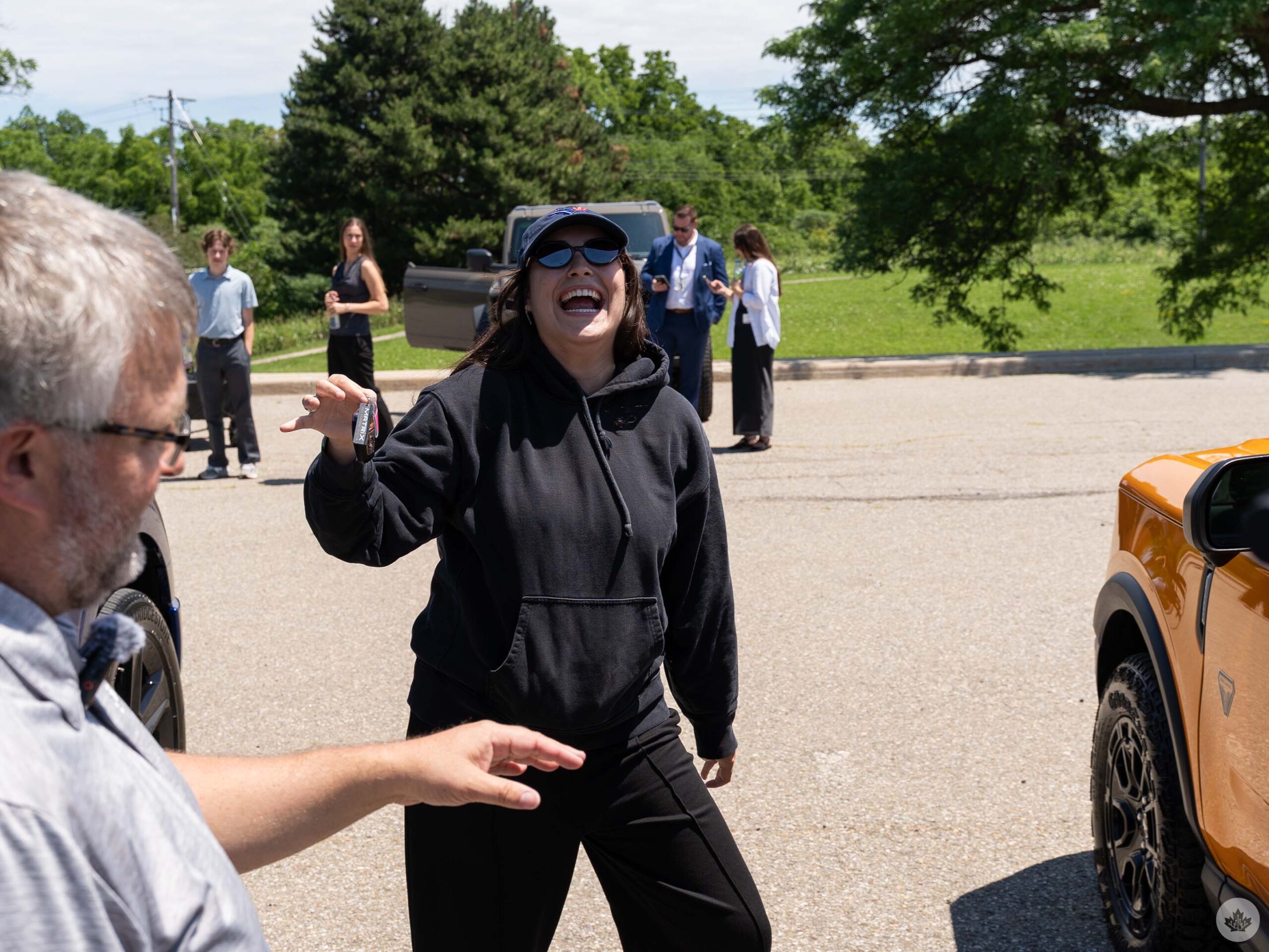 A thief makes off with car keys in Ford's mock theft demo.