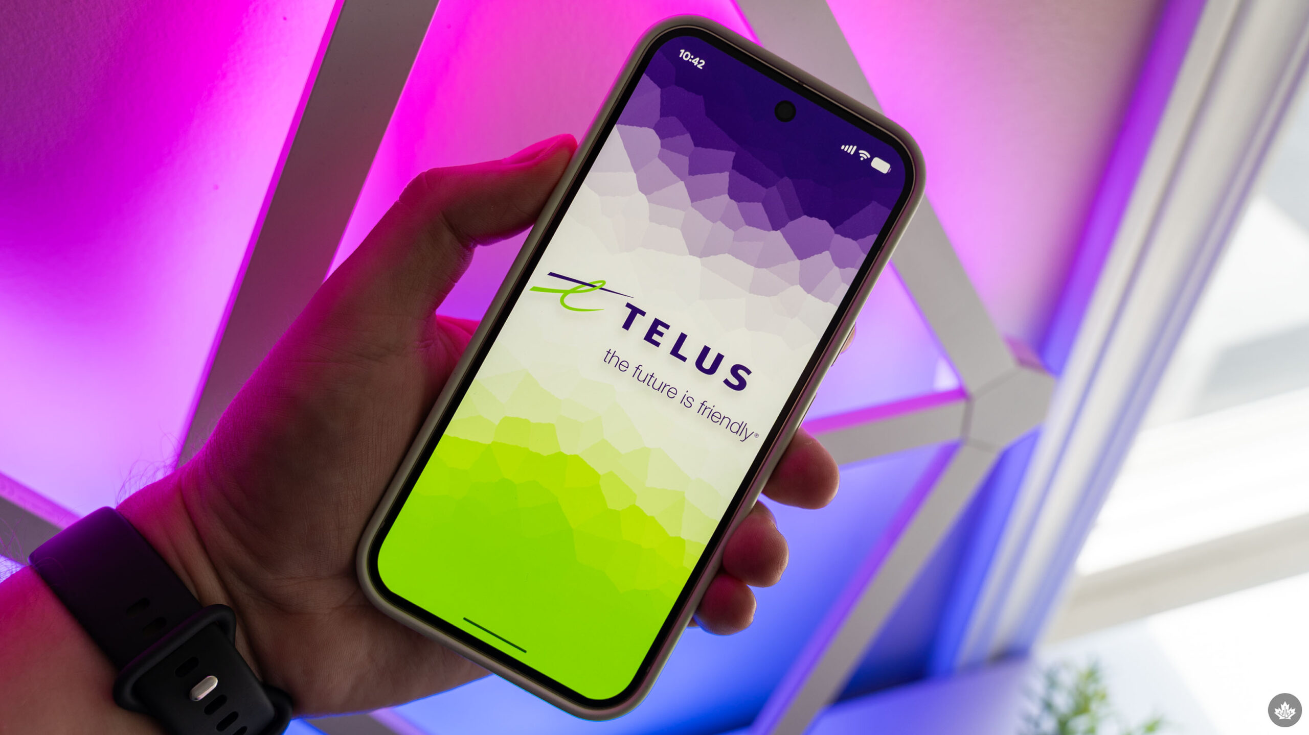 Telus logo on a smartphone