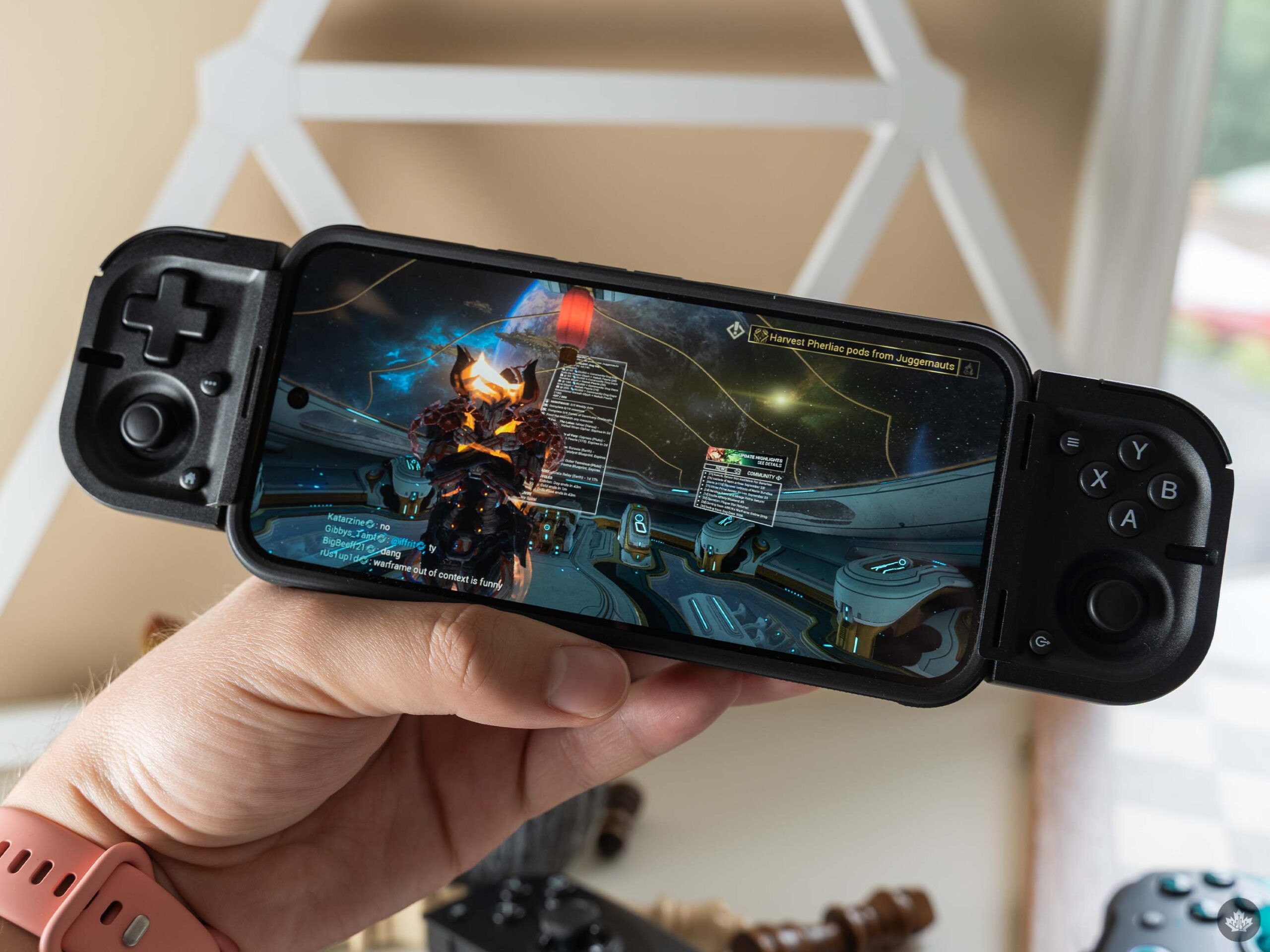 Warframe's Android port running on a phone with the Razer Prio.